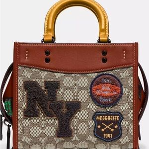 Coach Rogue 20 In Signature Textile Jacquard With Varsity Patches Used Twice.
